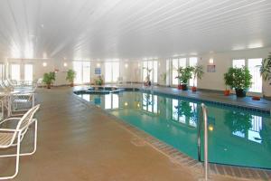 a large swimming pool in a large building at Adagio 503 in Ocean City
