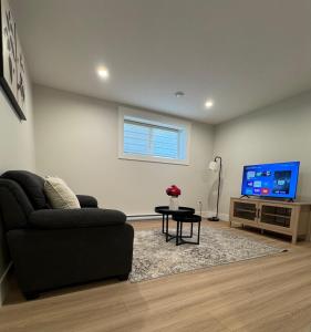 Μια τηλεόραση ή/και κέντρο ψυχαγωγίας στο Comfy Apartment