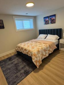 Ένα ή περισσότερα κρεβάτια σε δωμάτιο στο Comfy Apartment