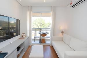 Телевизор и/или развлекательный центр в A6/404-Cobertura Duplex ao lado MorumBIS Einstein com Jacuzzi