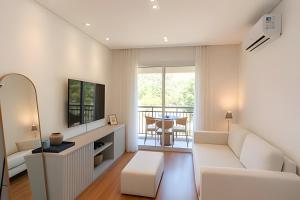 Телевизор и/или развлекательный центр в A6/404-Cobertura Duplex ao lado MorumBIS Einstein com Jacuzzi