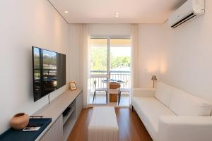 Телевизор и/или развлекательный центр в A6/404-Cobertura Duplex ao lado MorumBIS Einstein com Jacuzzi