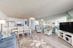 a living room with a dining room and a kitchen at Pyramid 6G in Ocean City