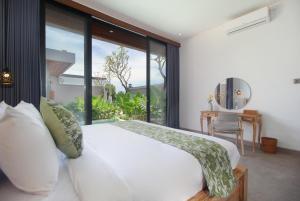 Voodi või voodid majutusasutuse Vila Padma Bali at Sayan - Ubud, A Trishula Collection toas +61 fotot