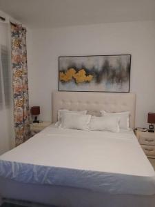 Ένα ή περισσότερα κρεβάτια σε δωμάτιο στο Chambre meublée