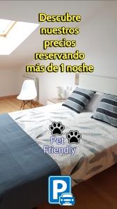 a bedroom with a bed with words on it at Secretos de Teruel VUT-TE-24-0075 in Teruel