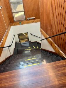 an overhead view of an escalator in a building at Hotel Plaza Los Leones in Curanilahue