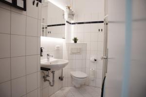 Koupelna v ubytování City-Apartment nähe Maschsee Komfort - Tierfreundlich + 18 fotografií