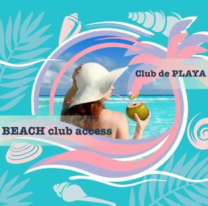 a woman drinking a cocktail on a beach club at SERENARA - VACATION SUITES DELUXE - playa LOS CORALES in Punta Cana
