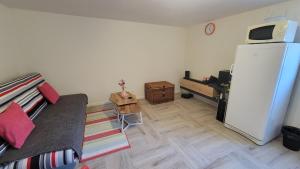 Η κουζίνα ή μικρή κουζίνα στο Studio indépendant tout équipé chez l'habitant