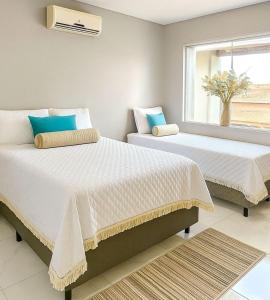 Ένα ή περισσότερα κρεβάτια σε δωμάτιο στο Brisamar