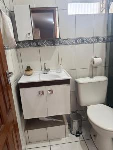 Ένα μπάνιο στο Kitnet ao lado do centro