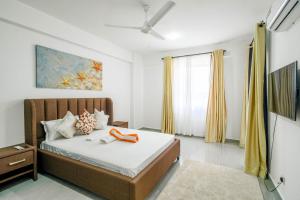 Ένα ή περισσότερα κρεβάτια σε δωμάτιο στο Bubbles Cozy Homes Aqua