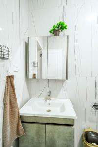 Ένα μπάνιο στο Bubbles Cozy Homes Aqua +57 φωτογραφίες