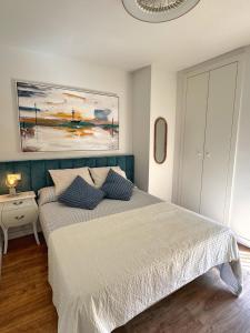 En eller flere senge i et værelse på Esmeralda Dreamy Sunset