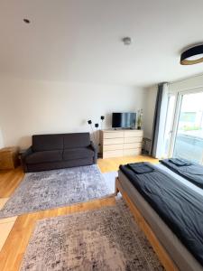 Χώρος καθιστικού στο Modernes Apartment nahe Bahnhof Pasing & Arcaden +3 φωτογραφίες