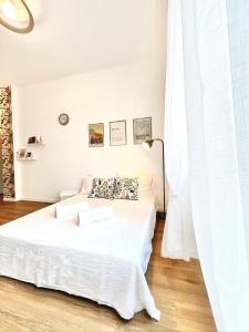 Ένα ή περισσότερα κρεβάτια σε δωμάτιο στο Charming Stay Bergamo City Center