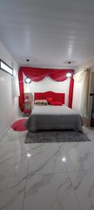 En eller flere senge i et værelse på Ksl refúgio dos pássaros