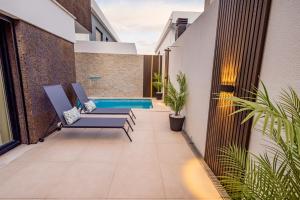 Ruang duduk di JolikaS House Heated Pool and EV point
