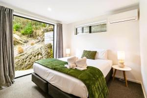 Giường trong phòng chung tại Grand Alpine Villa - 4 bedrooms