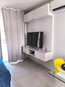TV a/nebo společenská místnost v ubytování FLAT CUPE BEACH - Porto de Galinhas