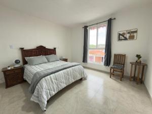 Postel nebo postele na pokoji v ubytování Casa Las Maravillas