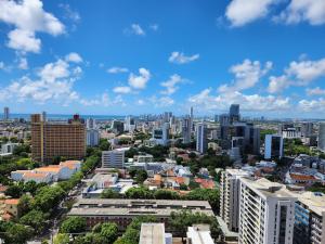 an aerial view of a city with tall buildings at Incrível Apto 2 quartos próx Consulado Americano in Recife