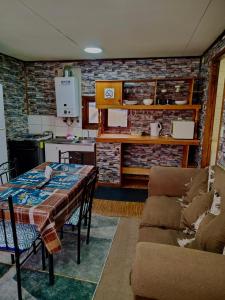 Η κουζίνα ή μικρή κουζίνα στο Cabañas Puerto Natales centro