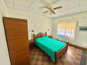 Ένα ή περισσότερα κρεβάτια σε δωμάτιο στο Alojamientos Meca