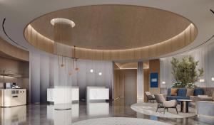een lobby met een rond plafond met stoelen en tafels bij Holiday Inn Express Shenzhen Sports Center by IHG in Shenzhen