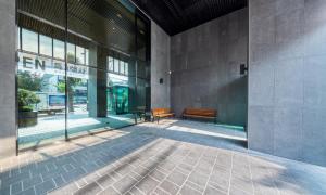 a building with two benches in front of a building at Dobong Hotel Bay204 in Seoul +32 photos