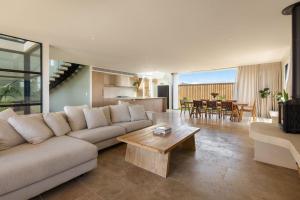 a living room with a couch and a table at Wave Break in North Creek