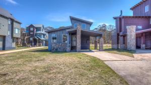 a home in a subdivision with houses at Cool Runnings in Dinner Plain