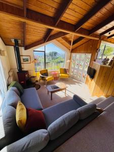 Et opholdsområde på Azalea Cottage