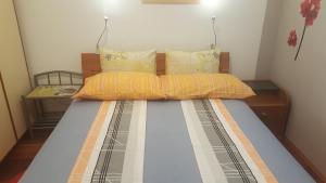 Postel nebo postele na pokoji v ubytování Apartment Mihaela