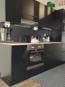 Kuchyň nebo kuchyňský kout v ubytování Olos koti