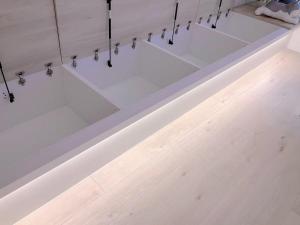a row of lights hanging from a ceiling at Zzz 台北好眠 - Monthly in Taipei +68 photos
