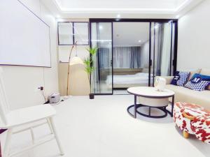 Photo de la galerie de l'établissement House of Great White Apartment, à Shenzhen