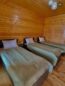 Postel nebo postele na pokoji v ubytování Султан