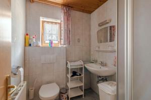 Koupelna v ubytování Haus Schimpfößl