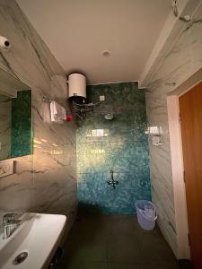 Koupelna v ubytování A R Signature Inn