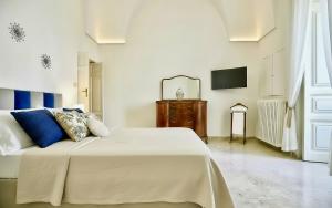 Ένα ή περισσότερα κρεβάτια σε δωμάτιο στο Suite la terrazza di Don Peppino +77 φωτογραφίες