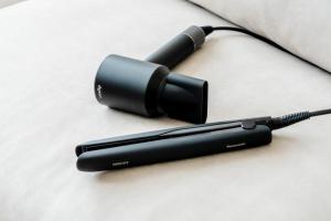 a black microphone sitting on top of a table at BOND COMFORT HOTEL MIYAJIMAGUCHI - Vacation STAY 80756v in Hatsukaichi