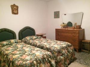 Säng eller sängar i ett rum på Residenza Cecchini