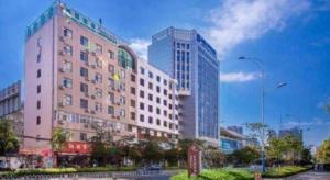 a group of tall buildings in a city at GreenTree Alliance Hotel Kunming Chuanjin Road Branch in Kunming