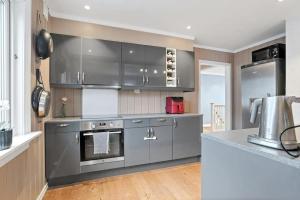 Η κουζίνα ή μικρή κουζίνα στο Private apartment on Hedensrud