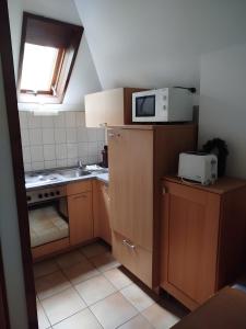 Dapur atau dapur kecil di Ferienhaus am Silbersee Frielendorf +3 gambar