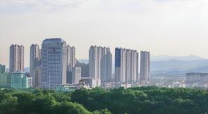 a group of tall buildings in a city at Xana Lite·Nanchang Changbei Jiangxi University of Finance and Economics in Nanchang