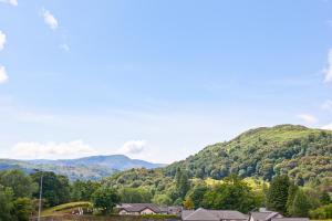 a view of a valley with mountains in the background at Diamond Lodge Boutique Adults Only Guest House in Ambleside +35 photos
