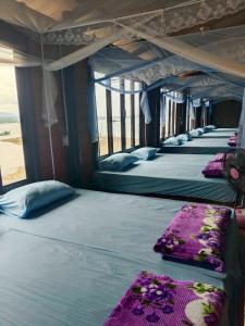 Postel nebo postele na pokoji v ubytování Poo Ley Home Stay Koh Pitak